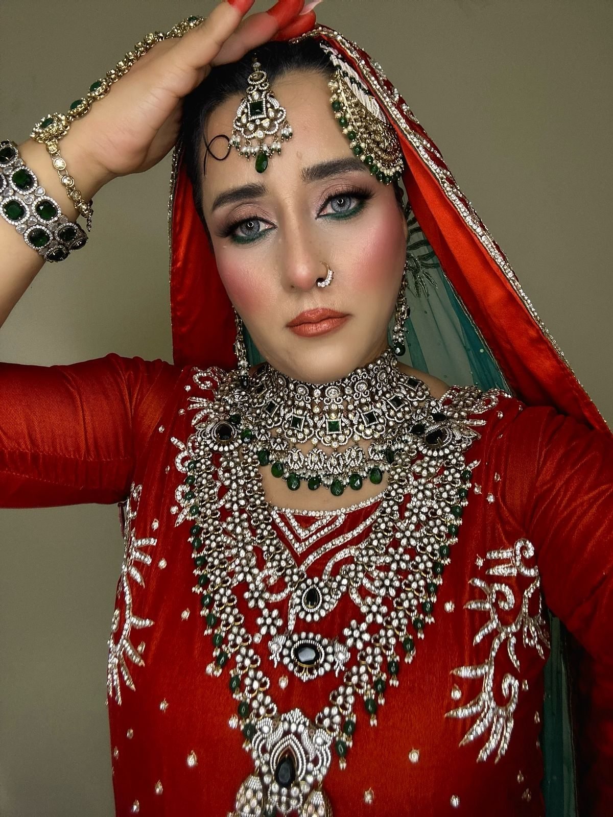 Detailed Asian bridal makeup artistry by Sana Kinaan in Dubai